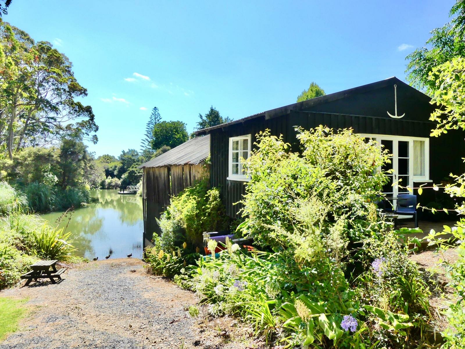 Boat House on River